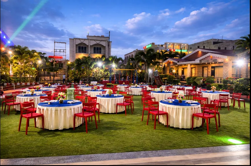 Outdoor banquet tables and chairs set for a reception